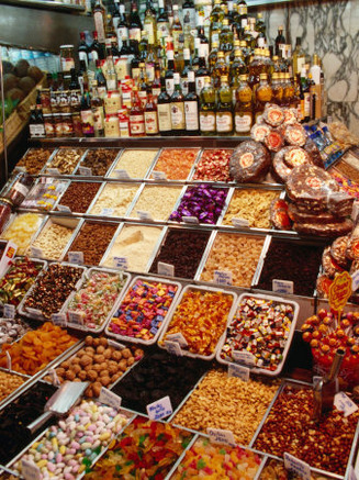 Display of Sweets Stall in Mercat De La Boqueria in La Rambla District, Barcelona, Spain