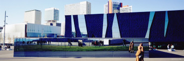 Tourists in Front of Triangle Building, the Forum, Barcelona, Spain