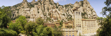 Rock Formations over a Monastery, Montserrat Monastery, Montserrat Barcelona, Catalonia, Spain