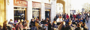 Tourists Sitting Outside of a Cafe, Barcelona, Spain
