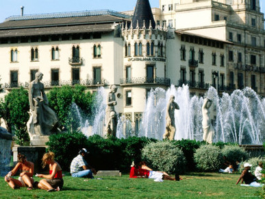 People Relaxing in Plaza de Catalunya, Barcelona, Catalonia, Spain